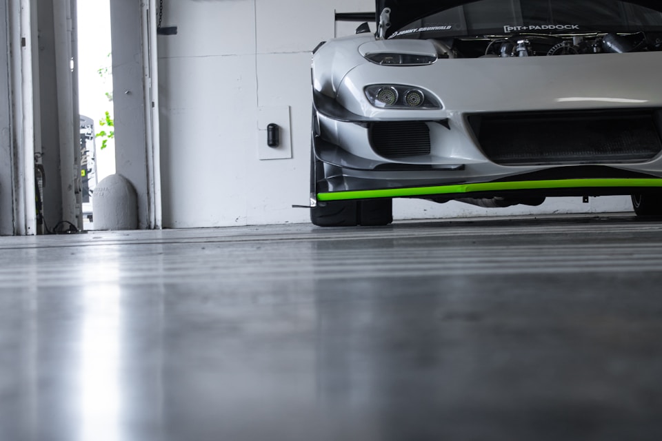 Polished concrete garage floor with sports car